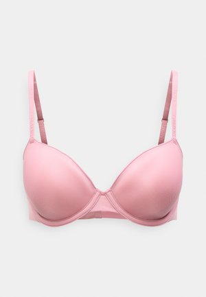 Ροζ σουτιέν με μπανέλα και λείες καλυμμένες κύπελλες, ρυθμιζόμενες τιράντες και λεπτομέρειες με το λογότυπο Calvin Klein στις τιράντες. Μαλακή υφή υφάσματος.