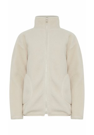 Chaqueta de forro polar beige con cuello alto, cremallera completa y dos bolsillos laterales. Textura suave y diseño casual, ideal para llevar en capas.