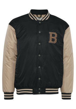 Black and beige varsity jacket featuring a "B" logo, snap buttons, ribbed cuffs, and striped collar detailing. Smooth fabric texture.