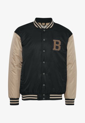 Veste varsity noire et beige avec un logo "B", boutons-pression, poignets côtelés et détails de col rayés. Texture de tissu lisse.