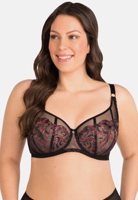 Zwarte mesh bh met levendige bloemborduursels in roze en groen. Heeft een diep decolleté, verstelbare banden en decoratieve hardware accenten.