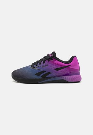 Purple and black athletic shoe with a mesh upper, textured accents, and a cushioned sole. Features contrasting branding on the side.