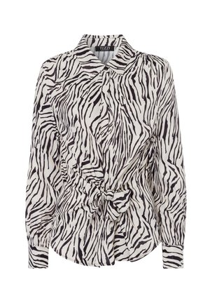 Overhemd met knopen in een zebraprint, met lange mouwen, een strikdetail in de taille en een kraag, in zwart-witte stof.