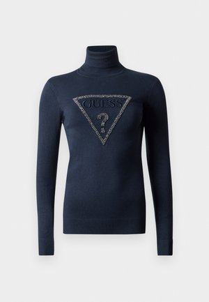 Námořnická modrá dlouhá halenka s rolákem, s žebrovanými manžetami a lemem, s korálkovým trojúhelníkovým logem GUESS a otazníkem.