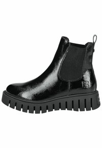 Botas Chelsea negras con un acabado brillante de charol, paneles laterales elásticos y una suela gruesa con surcos prominentes para un mejor agarre.