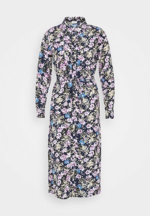 Robe à boutons florale en marine avec des fleurs multicolores. Manches longues, ceinture ajustable à la taille, tombe sous le genou avec une coupe droite.