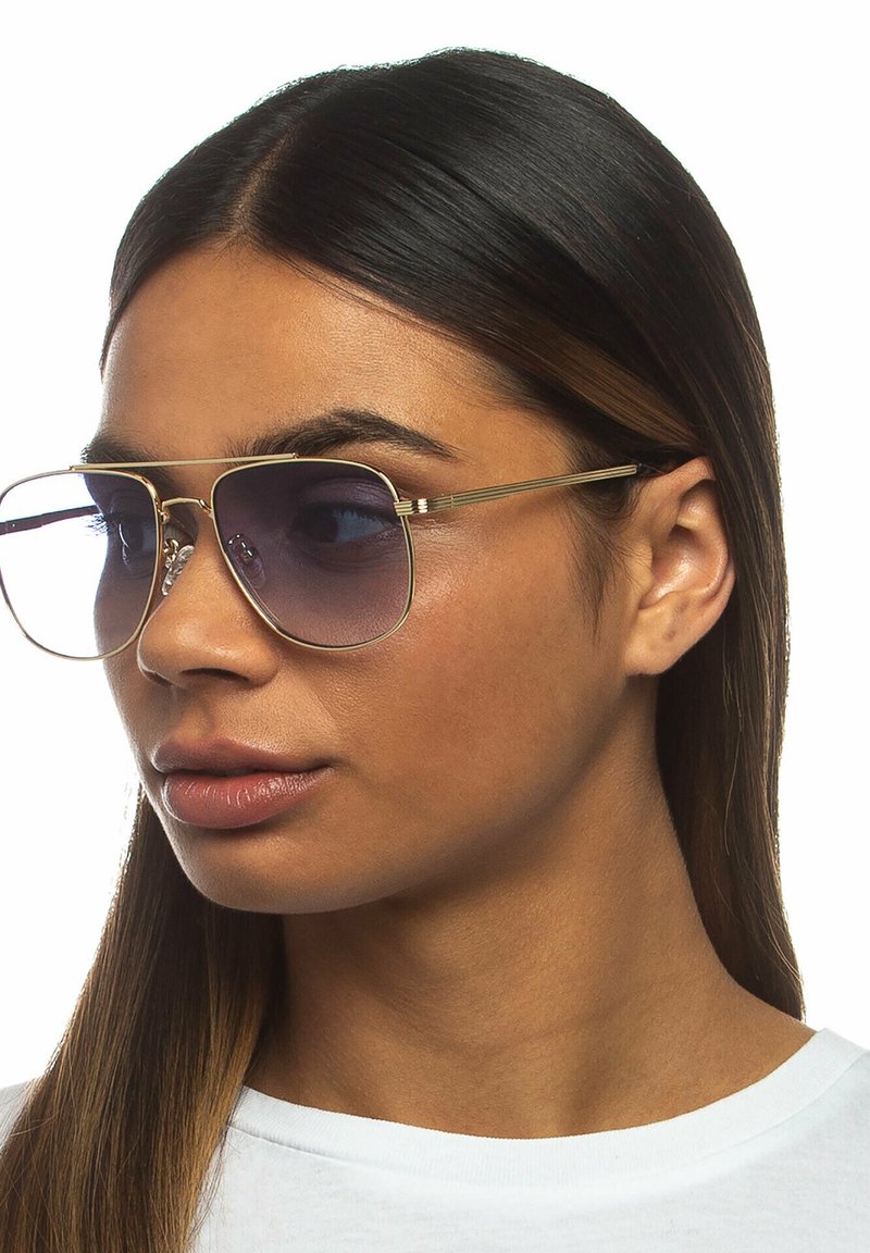 Le Specs THE CHARMER Occhiali da sole bright gold/giallo chiaro