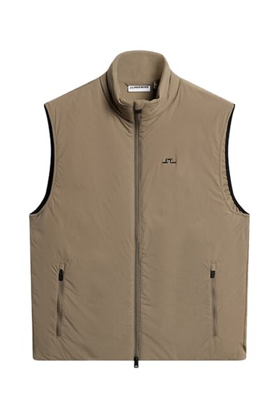 Αμάνικο γιλέκο σε μπεζ χρώμα με φερμουάρ, όρθιο γιακά, δύο πλαϊνές τσέπες με φερμουάρ και μικρό μαύρο κεντητό λογότυπο στο αριστερό στήθος.