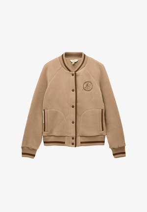 Beige Fleece-Bomberjacke mit braunem Besatz, Druckknopfverschluss, zwei vorderen Taschen, gerippten Bündchen, Saum und Kragen sowie aufgesticktem Logo auf der Brust.