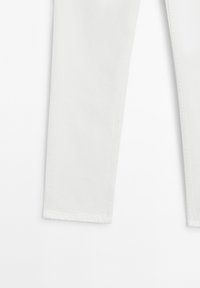 White denim jeans with a straight cut. Features classic five-pocket design and visible stitching. No patterns or hardware details.