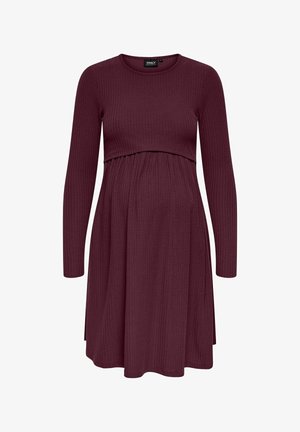 Abito premaman in tessuto a coste bordeaux, con scollatura rotonda, maniche lunghe e vita arricciata per maggiore comfort.
