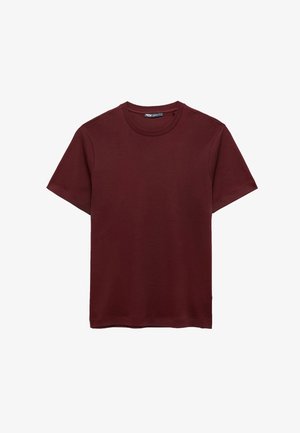 Burgundy kortærmet t-shirt lavet af blødt stof, med en rund halsudskæring og lige snit, uden synlige mønstre eller accenter.