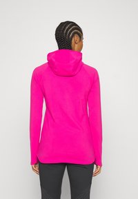 Nike Performance Jersey con capucha - pink