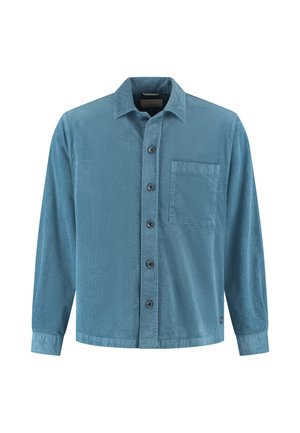 Blå corduroyskjorte med lange ermer, knappelukking foran, en enkelt brystlomme og klassisk krage mot en hvit bakgrunn.