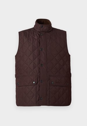 Brązowa pikowana kamizelka z wysokim kołnierzem, zatrzaskami i dwoma przednimi kieszeniami. Posiada diamentowy wzór oraz gładką teksturę.