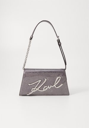 Metallic grey handbag with a structured trapezoid shape, featuring a silver signature logo and a combination chain and leather strap.