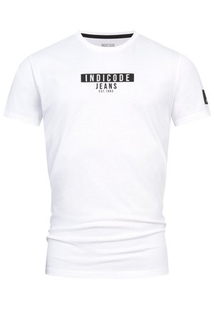 White cotton t-shirt with short sleeves, featuring a black “INDICODE JEANS” logo and “EST.1993” text. Simple, crew neck design.