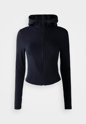 Marineblauwe ritssluiting hoodie met een aansluitend ontwerp, lange mouwen en een hoge kraag. Soepele, rekbare stof met naaddetails.