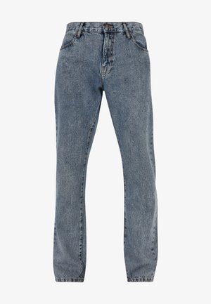 Jean en denim bleu taille haute, jambe droite, avec poches avant, passants pour ceinture et fermeture à bouton.