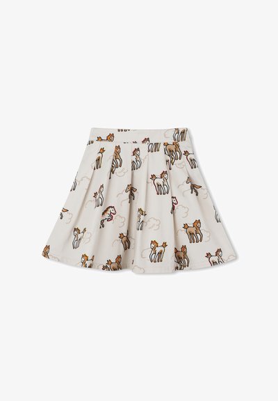 Jupe plissée en tissu crème avec un imprimé de chevaux et licornes colorés. La ceinture est plate sans aucune pièce métallique supplémentaire.