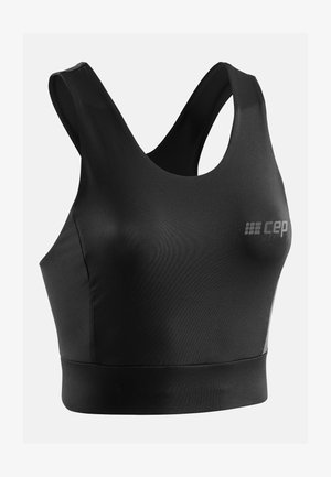 Reggiseno sportivo nero con scollatura a giro, spalline larghe e un elastico aderente nella parte inferiore. Realizzato in materiale morbido e elastico.