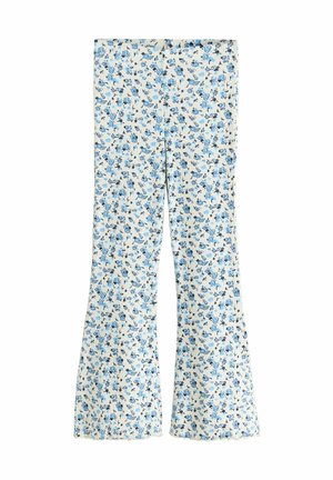 Flared trousers made of a lightweight, patterned fabric featuring blue floral designs on a cream background. Frayed hem details.