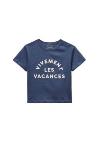 T-shirt en coton bleu marine à manches courtes. Présente "VIVEMENT LES VACANCES" en texte crémeux en gras sur le devant. Texture douce.