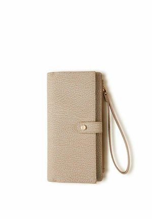 Beige textured wristlet wallet with a snap-button flap and zippered compartment, isolated on white background.