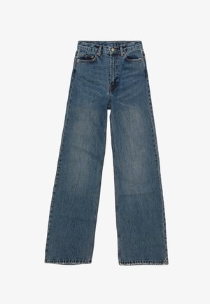 Blue denim wide-leg jeans with a high waist, five pockets, and contrasting stitching. Fades and minor distressing visible on fabric.