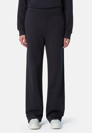 Pantaloni della tuta navy con una vestibilità comoda, realizzati in tessuto morbido. Presentano una vita elastica e polsini a coste. Design minimalista senza motivi.