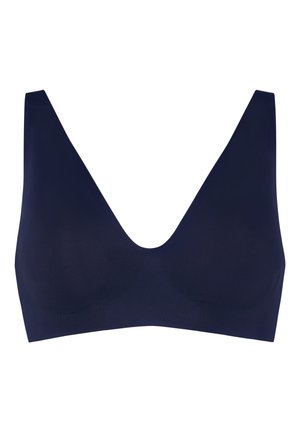 Brassière sans couture bleu marine avec larges bretelles et décolleté en V profond, conçue pour un maintien léger et un confort optimal.