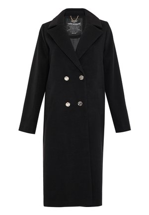 Zwarte wollen jas met een dubbelzijdig ontwerp, een geknipt kraag en zilveren knopen. De jas heeft lange mouwen en zijzakken.