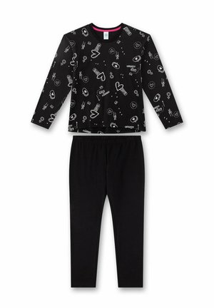 Top nero a maniche lunghe con simboli grafici bianchi e testo abbinato a leggings neri, mostrato su sfondo bianco.