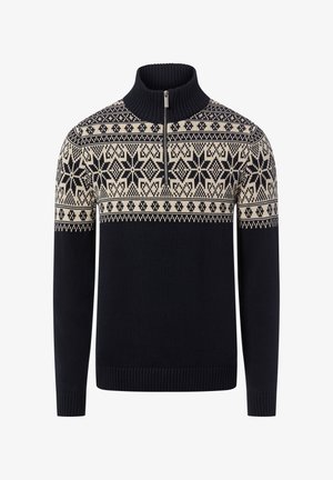Marineblauer Pullover mit hohem Kragen, halbem Reißverschluss und cremefarbenem nordischem Muster mit Schneeflocken und geometrischen Formen auf der Brust.