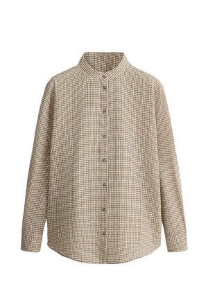 Beige ja ruskearuudullinen pitkähihainen nappipaita, jossa on pystykaulus ja kaareva helma, esitetty valkoisella taustalla.