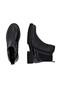 Bottines noires en cuir lisse avec un panneau latéral texturé, fermeture éclair sur le côté et semelle en caoutchouc épaisse.