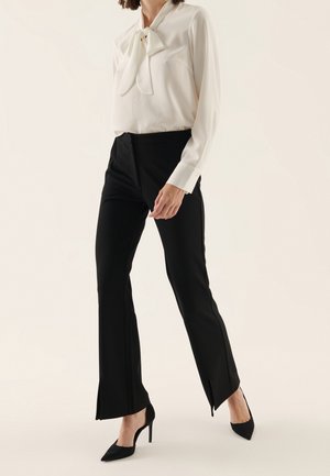 Pantalones - black