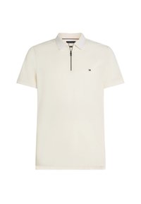 Polo a maniche corte color crema, con zip sul collo e colletto a righe a contrasto. Piccolo logo sul petto, texture liscia e design aderente.