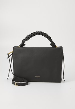 Black leather handbag with a braided handle, smooth texture, zip closure, gold hardware, and an adjustable shoulder strap. Brand logo visible.