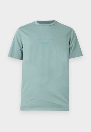Licht turquoise T-shirt met korte mouwen en ronde hals, voorzien van een subtiel geperst logo in het midden van de borst.