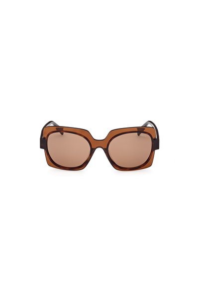 Gafas de sol de tono marrón con un marco grueso y cuadrado. Material marrón transparente con detalles en marrón oscuro sólido en las patillas.