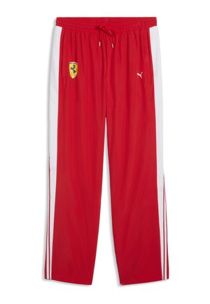 Red track pants with white side stripes, Ferrari logo on the left thigh, and Puma logo on the right thigh, elastic waistband with drawstring.