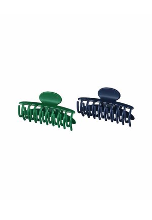 Two hair clips: one green and one dark blue, made of plastic, featuring a curved design with multiple gripping prongs for secure hold.