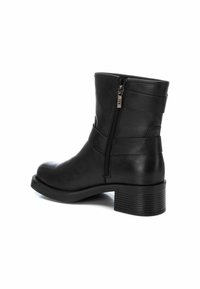 XTI Botines camperos - black