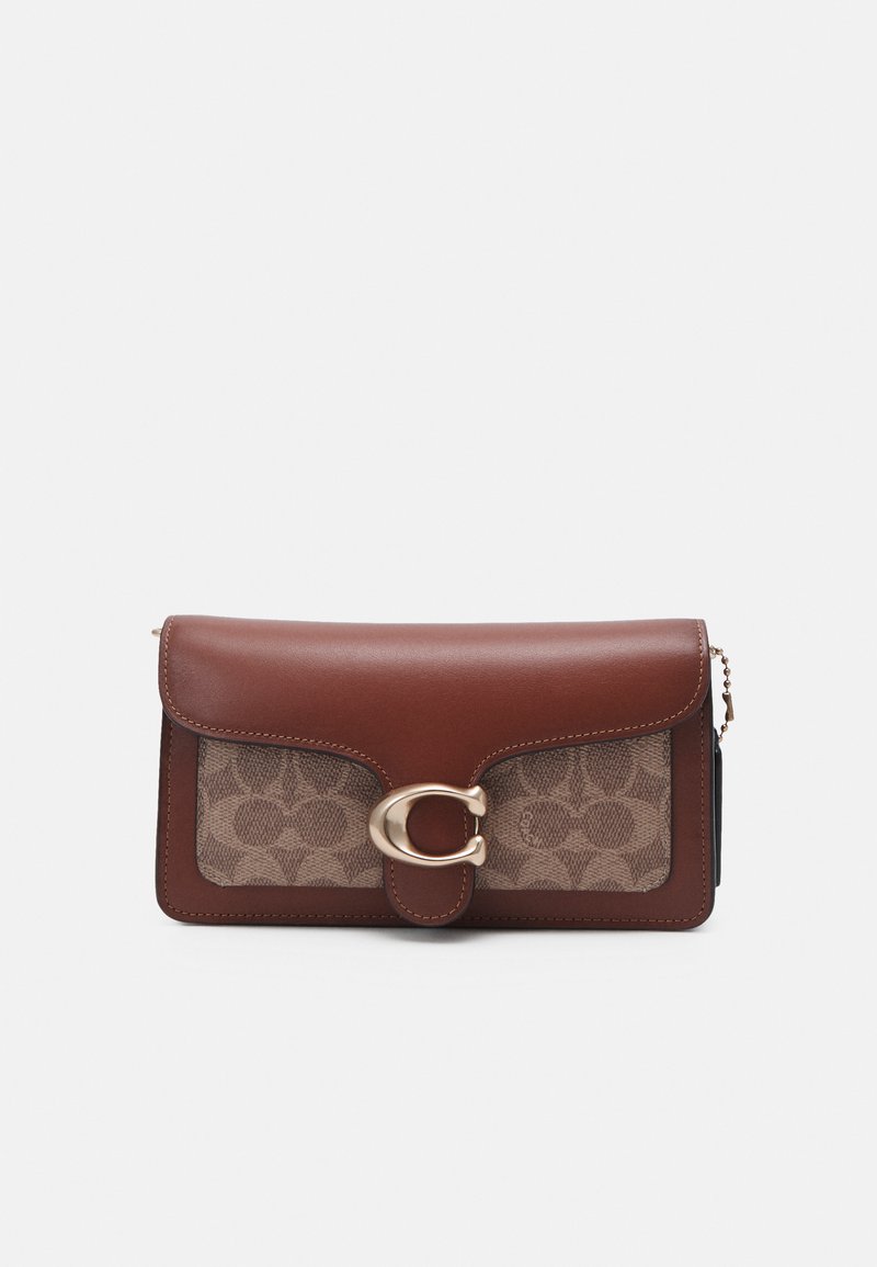 Brown leather wallet with a patterned fabric front. Features a gold circular clasp and a chain strap, smooth texture, and curved edges.