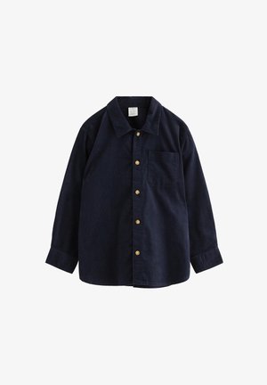 Tengerészkék kordbársony ing, hosszú ujjú, hegyes gallér, egyetlen mellzseb, arany gombos záródás, puha tapintás, laza kialakítás.