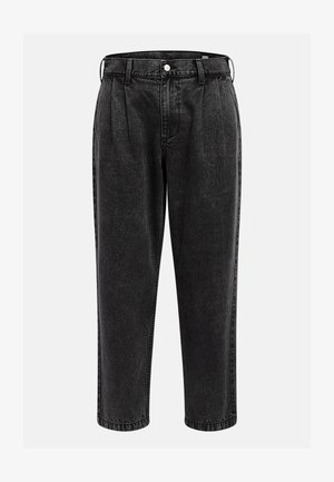 Black denim trousers with a relaxed fit, featuring pleats, a tapered leg, front pockets, and a simple button and zipper closure.
