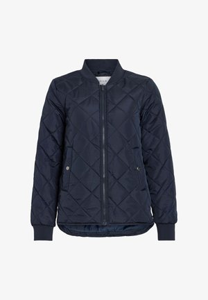 Veste matelassée bleu marine avec motif en losanges, poignets côtelés et fermeture éclair frontale. Comprend des poches latérales et un col rond.