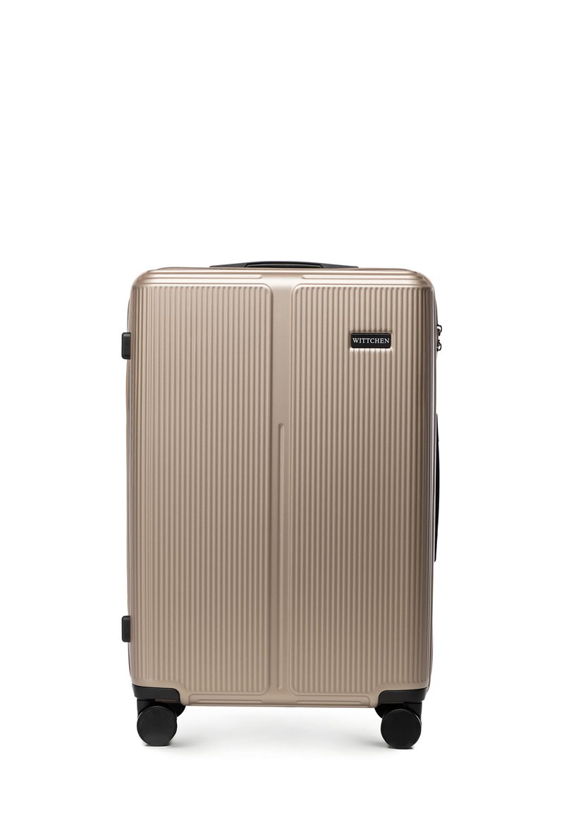 Hard-shell beige koffer met verticale ribbels, vier zwarte spinwielen, zijhandgreep en het "Wittchen" logo op de voorkant.