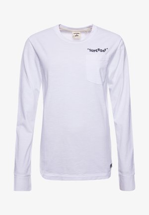 Biała koszulka z długim rękawem z bawełny, z okrągłym dekoltem, z kieszonką na lewej piersi oraz nadrukiem "SUPERDRY" w ciemnoniebieskim kolorze.